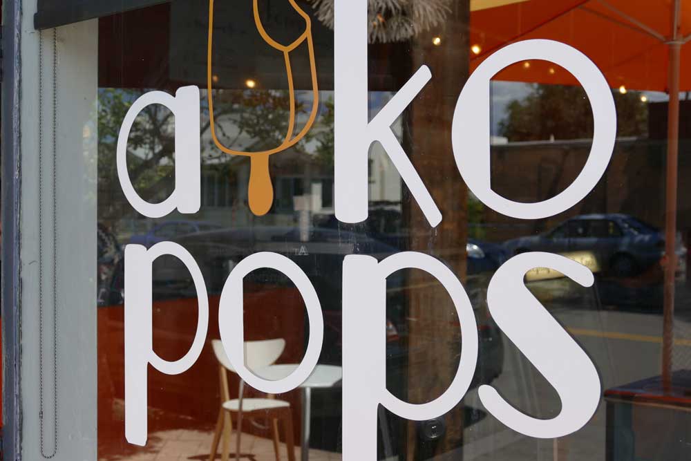 Aiko pops window sign