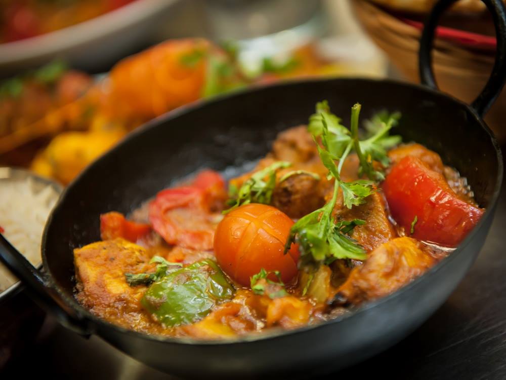 Bombay Bistro cooking a curry