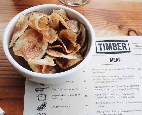 Chips in a bowl on top of Timber's menu