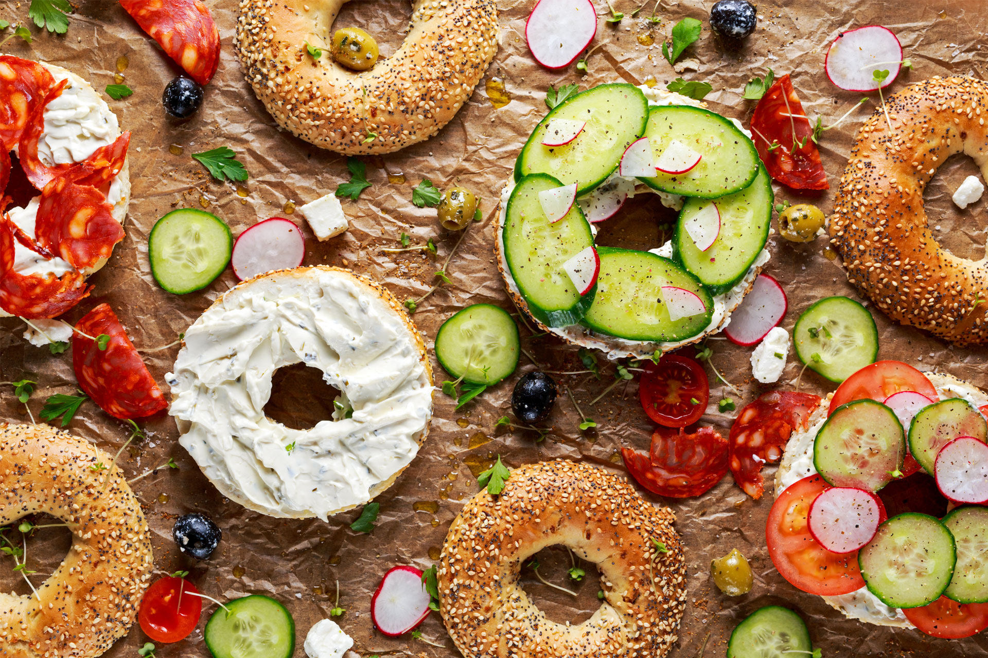 Breakfast bagels with different toppings