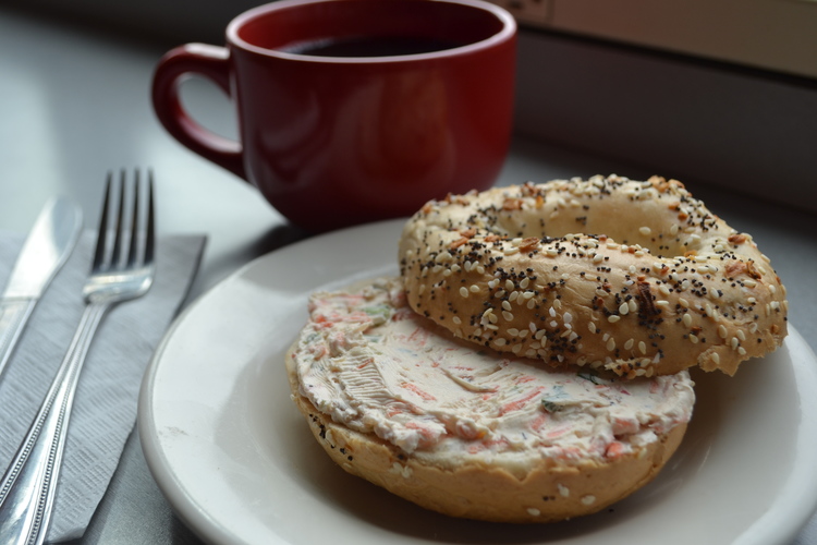 Hi Rise Bakery bagel with cream cheese and coffee