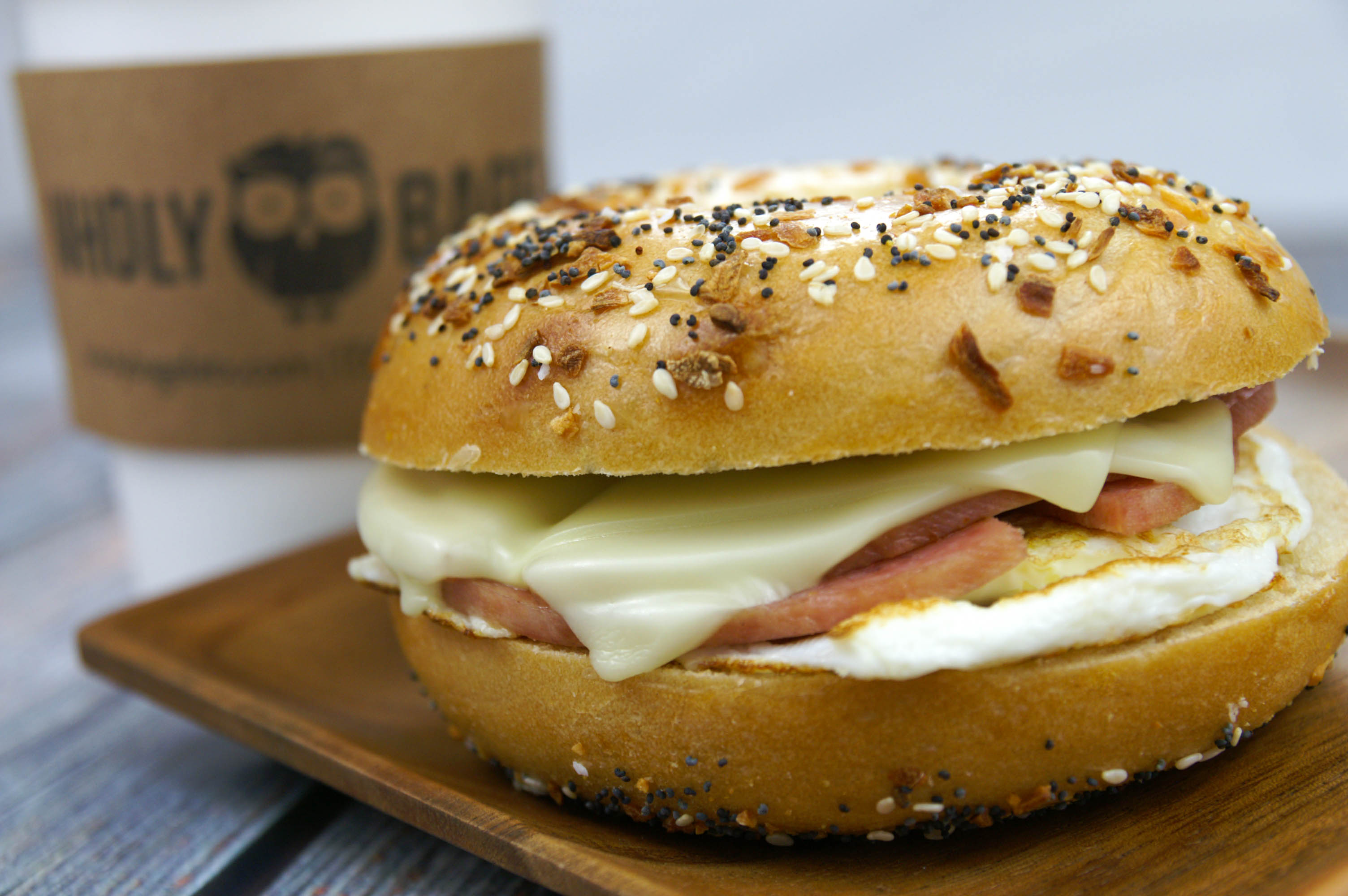 Wholy Bagel's breakfast bagel and coffee