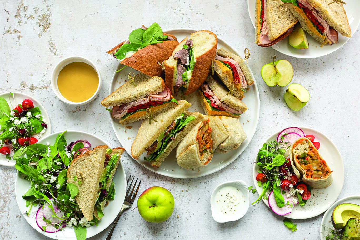 The Wedge's sandwiches, salads, and wraps on a table