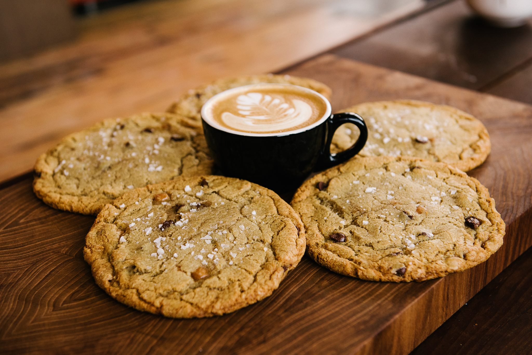 T-Rex's cookies and coffee on a board