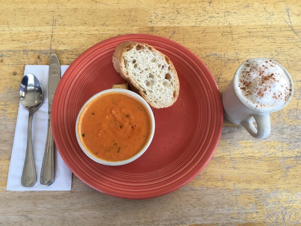 Turtle Restaurant's tomato basil soup with bread and a latte