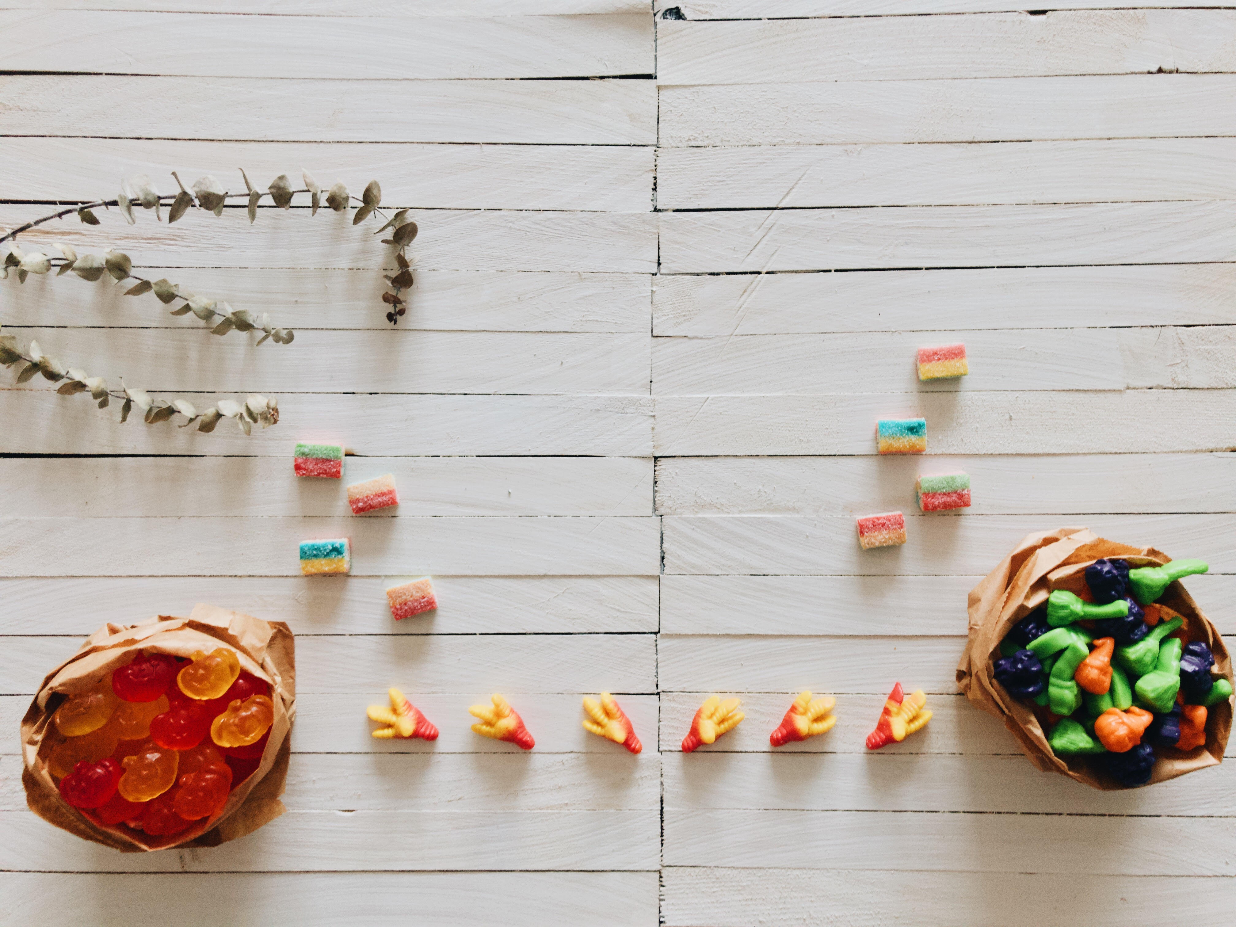 Halloween gummies on a wooden table
