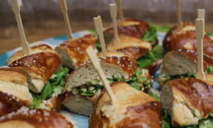 Boulder Colorado's Organic Sandwich Co.'s ham and cheese sandwiches in pretzel buns on a platter