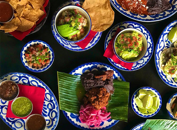 A table full of mexican dishes from Milagro Cantina