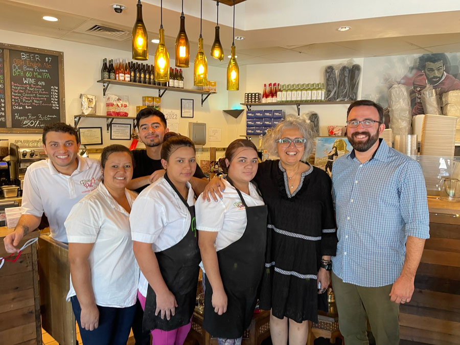 The Fava pot team standing together inside the Fava Pot restaurant.