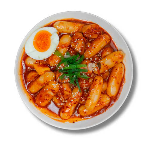 A bowl of kimchi with a hard boiled egg.