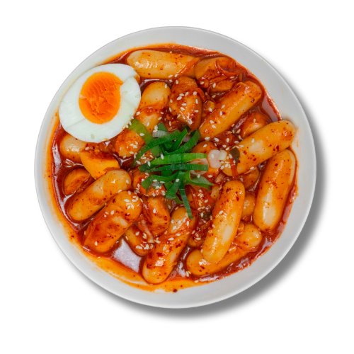 A bowl of kimchi with a hard boiled egg.