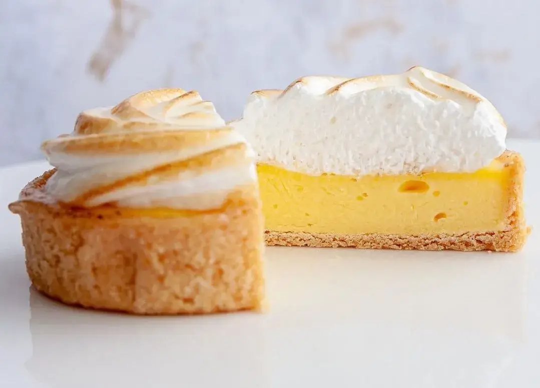 Two slices of lemon meringue pie